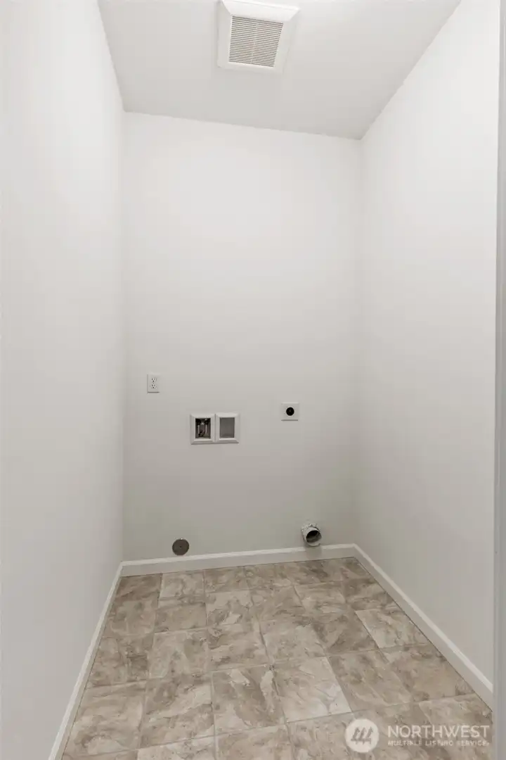 **This home is under construction** Photos are of same plan in the community. Colors and features will vary.