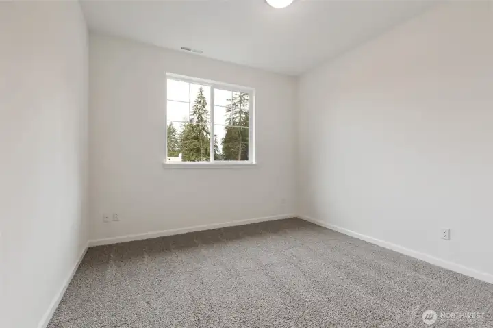 **This home is under construction** Photos are of same plan in the community. Colors and features will vary.