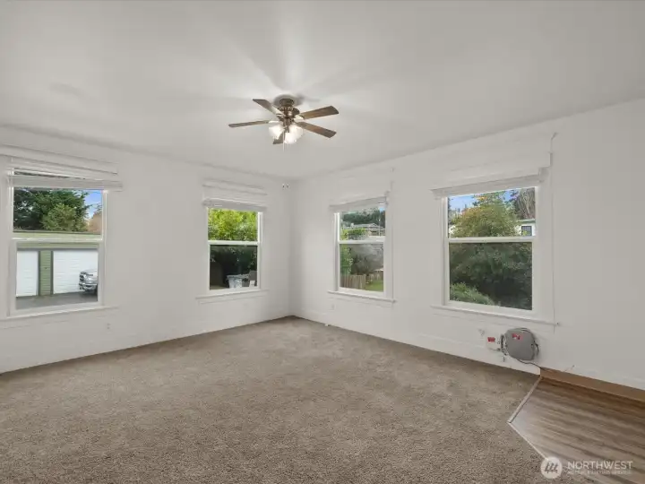 Light and bright units with large windows, and original wood millwork.