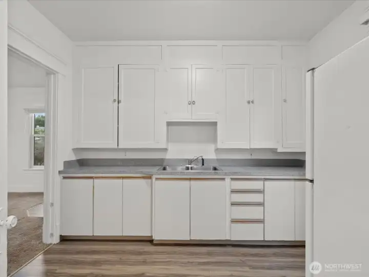 Light and bright units with large windows, and original wood millwork.