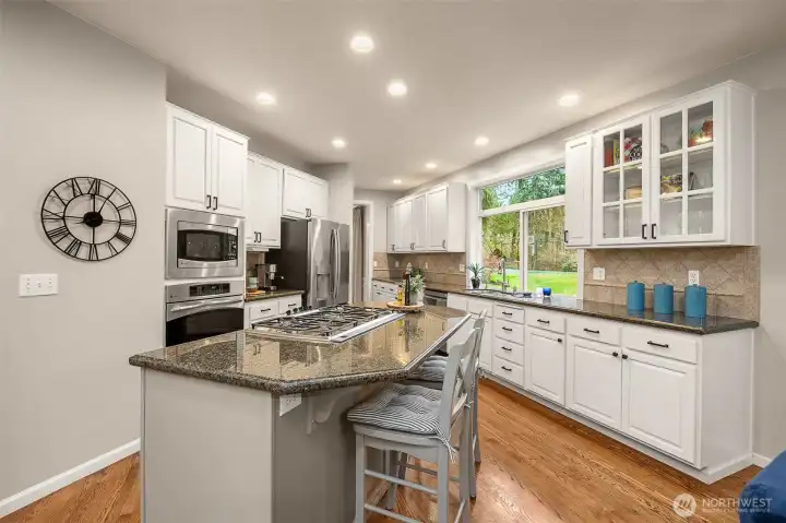 Gourmet kitchen with generous island and walk-in pantry