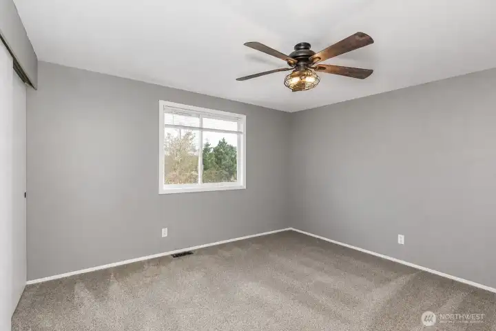 This AI generated photo demonstrates the primary bedroom with no furniture. Sellers have just move their furniture from the home.