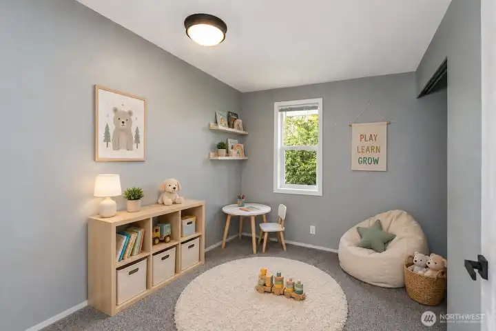 This AI digitally staged photo demonstrates the 3rd bedroom. Sellers have just move their furniture from the home.
