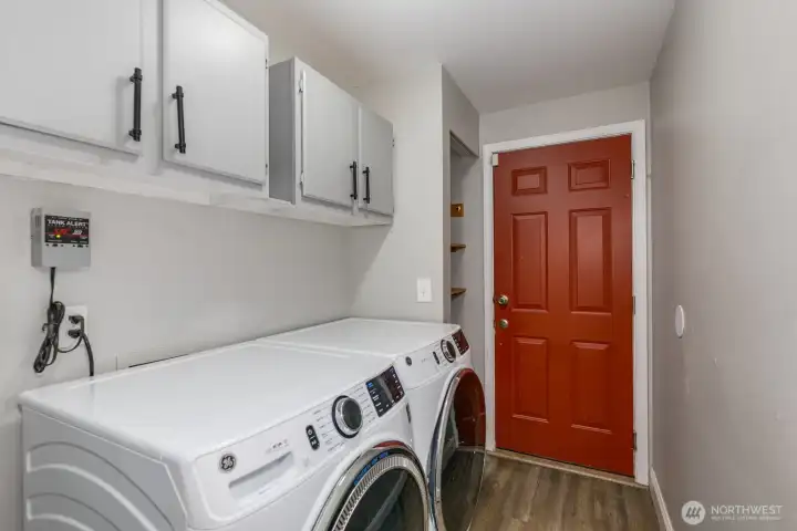 Laundry room and access to the garage on hte main floo