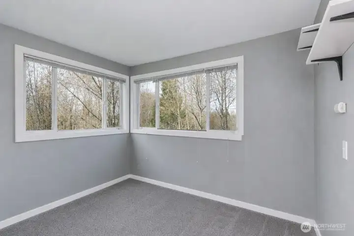 This AI generated photo demonstrates the 4th bedroom with no furniture. Sellers have just move their furniture from the home.