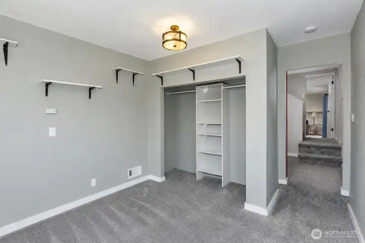 This AI generated photo demonstrates the 4th bedroom with no furniture. Sellers have just move their furniture from the home.
