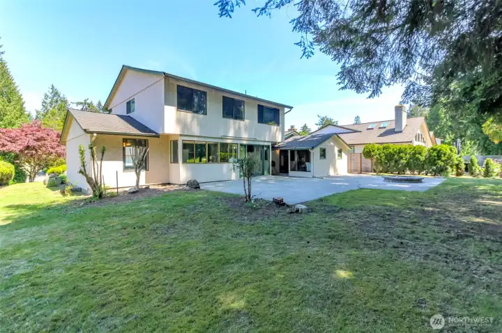 Spacious backyard with patio. Spacious backyard with patio.