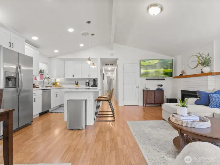 Another view of the living space from the entry area toward the hallway.