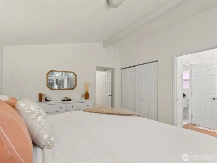 View of primary bedroom back toward the hall.