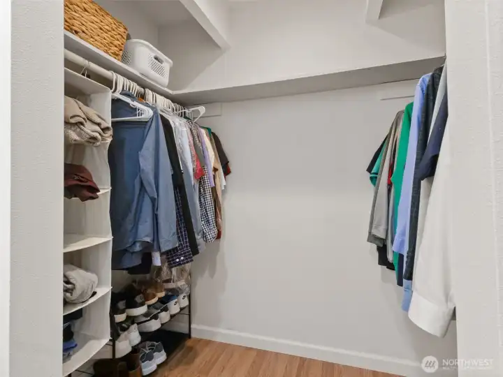 Primary bedroom walk-in closet.