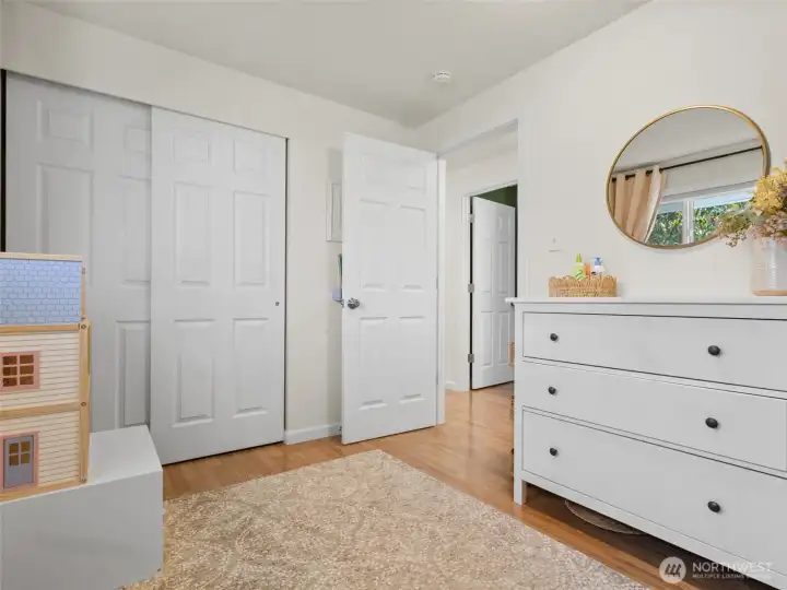 View of bedroom 2 looking toward the closet.