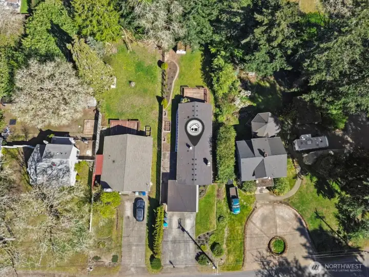 Aerial view. Home is near Steilacoom Lake and Edgewater Park.