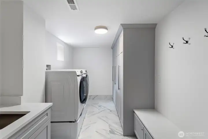 Laundry/ mud room, lower level, connected to garage