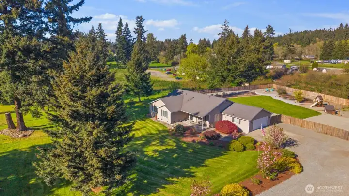 Your surrounded by lush foliage and custom landcaping so meticulously maintained, your neighbors will surely notice!