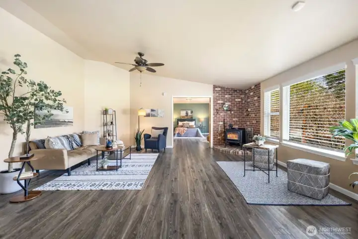 New hardwood laminate flooring is durable and water resistant for the pets and high traffic!