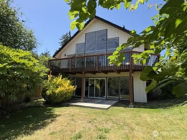 PNW A frame home with beautiful yard.