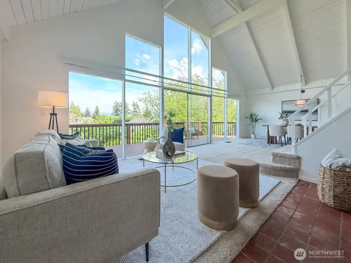 Large expansive windows with slider to deck for easy entertaing