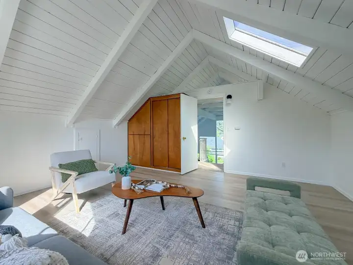 Original built in closet with skylight in the loft area