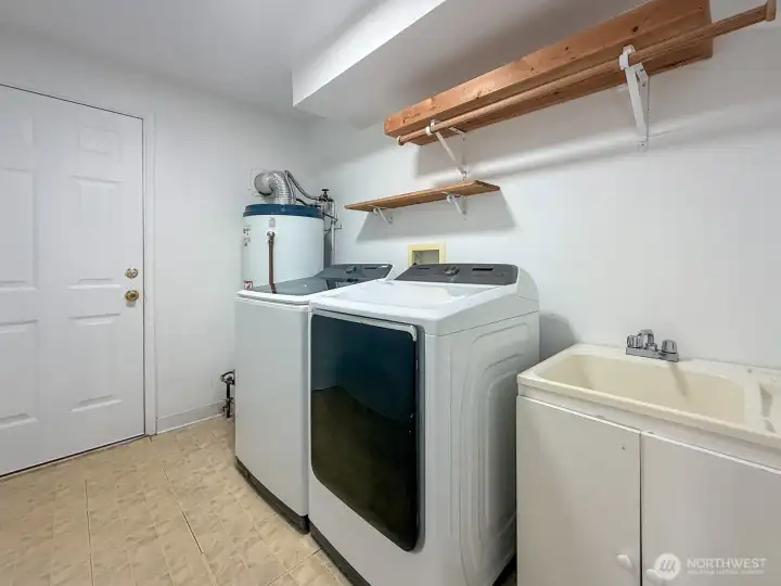 Utility room washer and dryer also access to outdoors