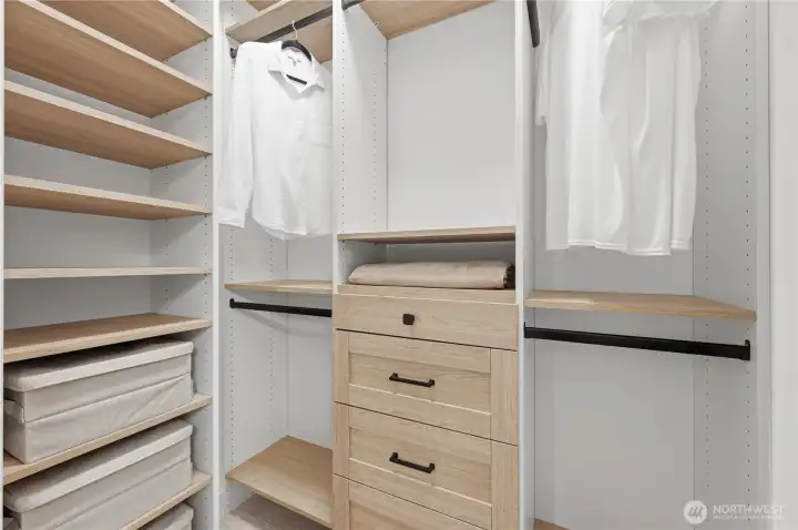 New primary walk-in closet with new efficient custom closet organizers maximizing storage. New primary walk-in closet with new efficient custom closet organizers maximizing storage.