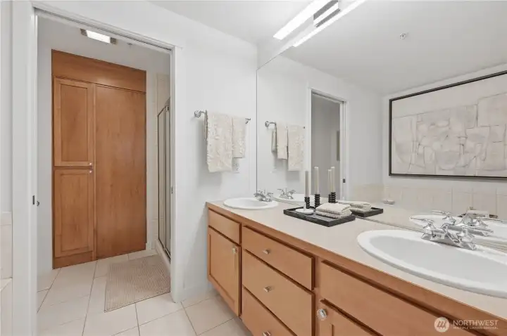 Primary double vanity bath with built-in linen, separate soaking tub & shower. Primary double vanity bath with built-in linen, separate soaking tub & shower.