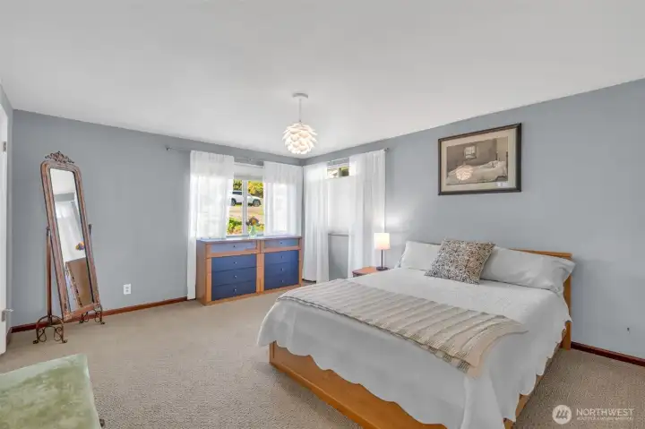 Main level bedroom is a peaceful retreat at the end of the day.