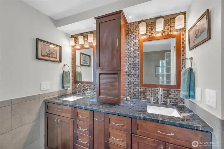 Main level 3/4 bathroom with dual sink vanity.