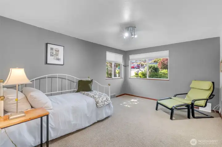 Main level - spacious additional bedroom with pleasant outlooks.