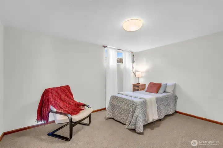 Lower level bedroom. Comfortable accommodations for guests or household members.