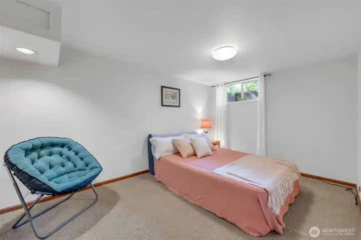 Versatile lower level bedroom.