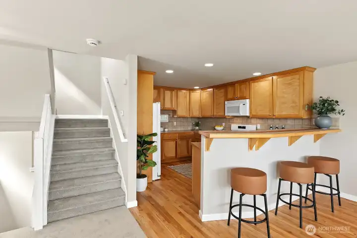 The kitchen offers a counter for casual eating