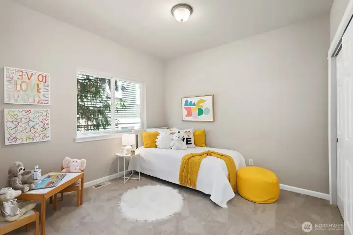 The second bedroom on the upper level