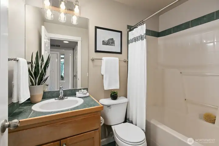 The bath on the lower level has tub with shower