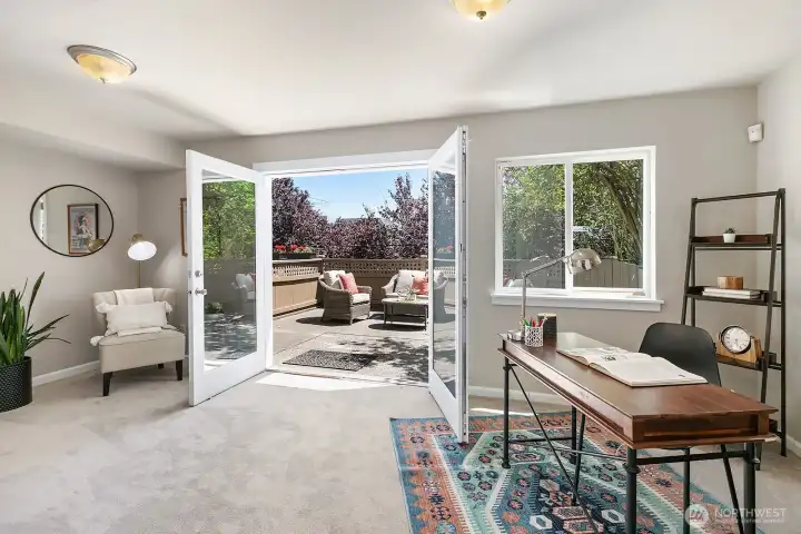 The extra roon the lower level qualifies as a bedroom. This would also make a lovely office.  French doors open to a private patio