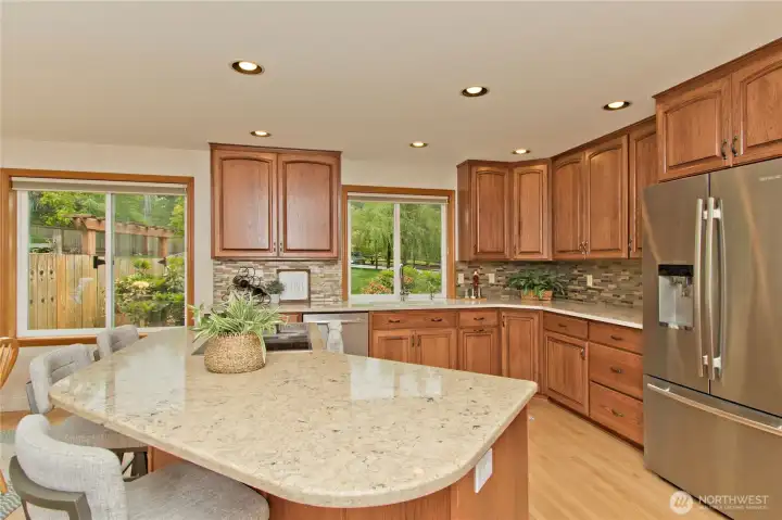 Quartz countertops, soft close cabinets, touchless sink