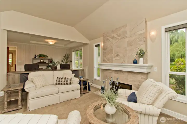 Living room is attached to the formal dining room.