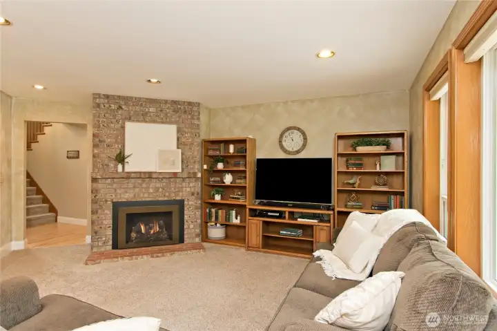Living room with gas fireplace.