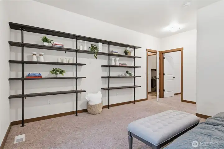 Beautiful built in shelves in the large primary bedroom