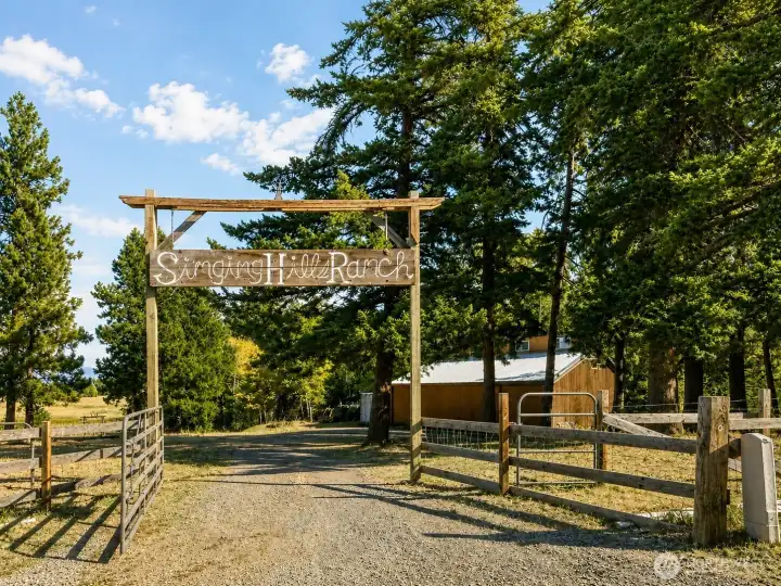 Gated entry on this fully fenced 11.61 acre