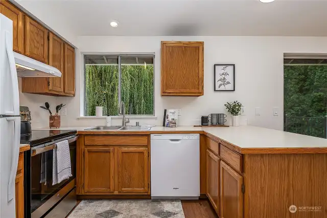 The kitchen is efficiently organized with ample cabinetry space.