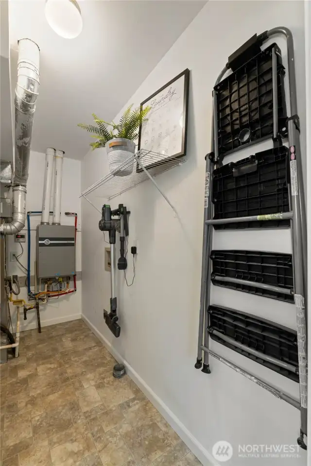 Laundry with tankless water heater.