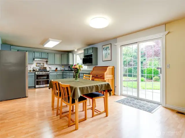 Kitchen eating area with gorgeous sliding doors to private outdoor space.