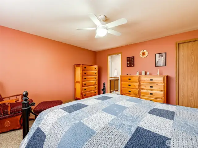 Primary bedroom with ensuite and walk-in closet.