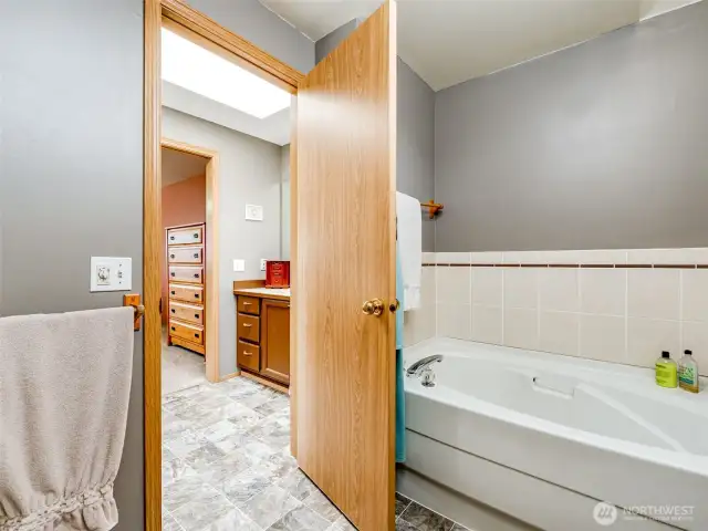 Primary ensuite with private soaking tub.