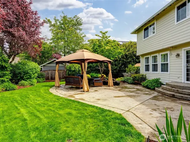 Beautifully landscaped backyard with private patio!