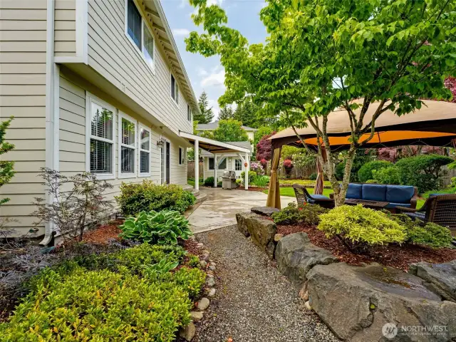 Professionally landscaped private pathways.