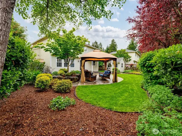 Established and meticulously manicured backyard.