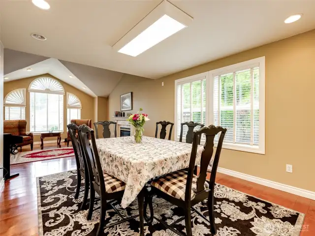 Formal dining room with plantation shutters.