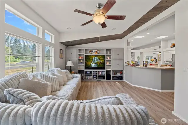 Light, bright family room with beautiful built-ins
