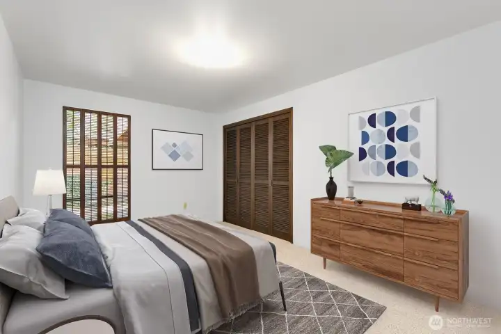 2nd bedroom on main level. The (closed) window looks out into the backyard.